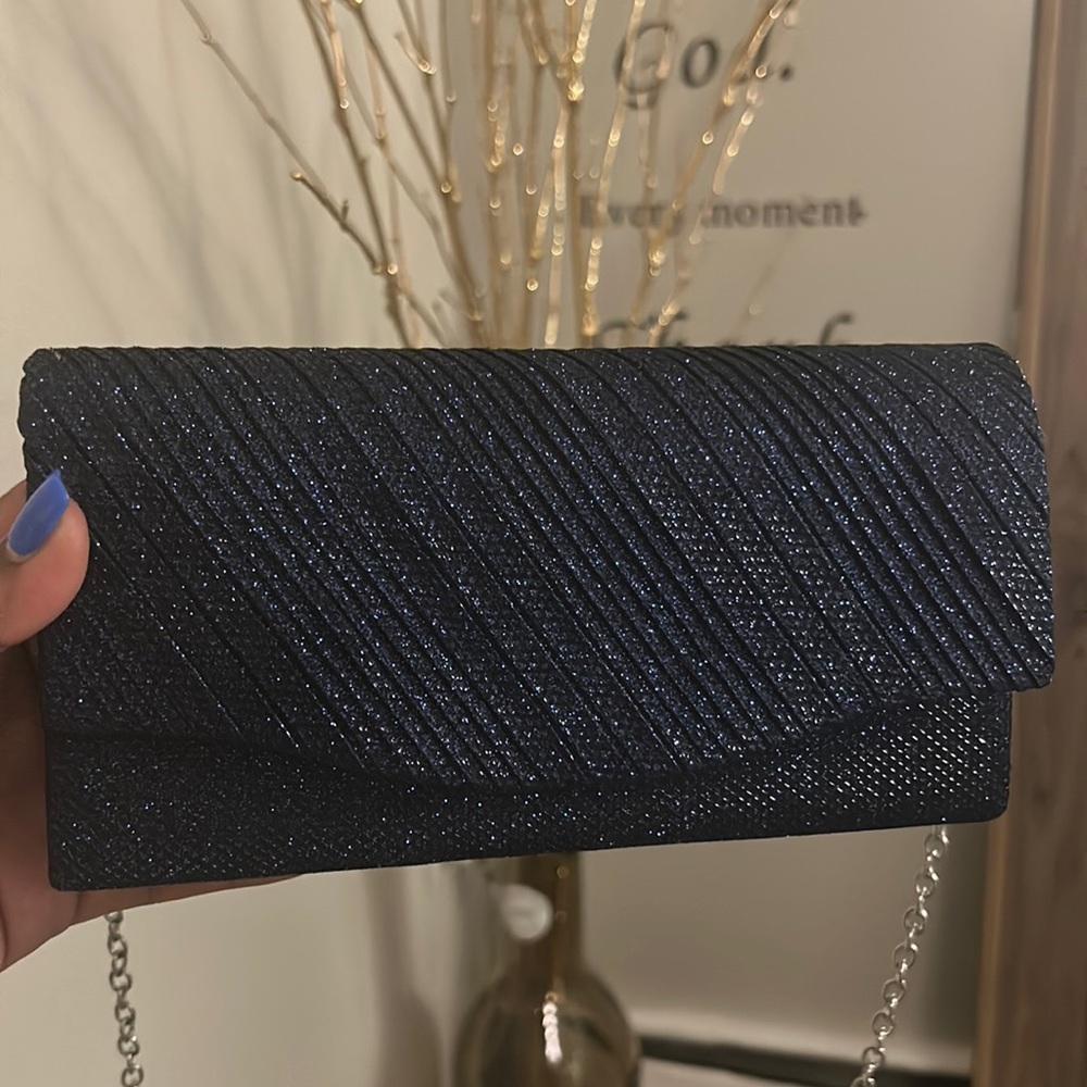 glitter beautiful night small bag…used like new!! Can fit phone, keys small thin